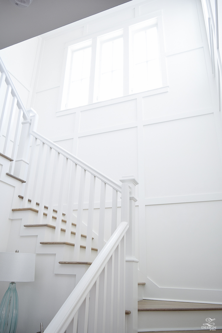 White staircase with grid pattern beach house decor beach house design coastal house design wooden handrail on staircase-2