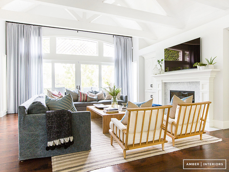 Custom Home Build Journey Inspiration Building a custom home in houston, texas -Living room with vaulted ceiling and large steel windows off back of house