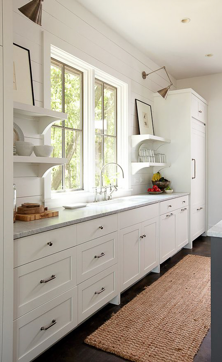 windows behind sink in farmhouse kitchen custom home builder in houston texas custom home build jouney