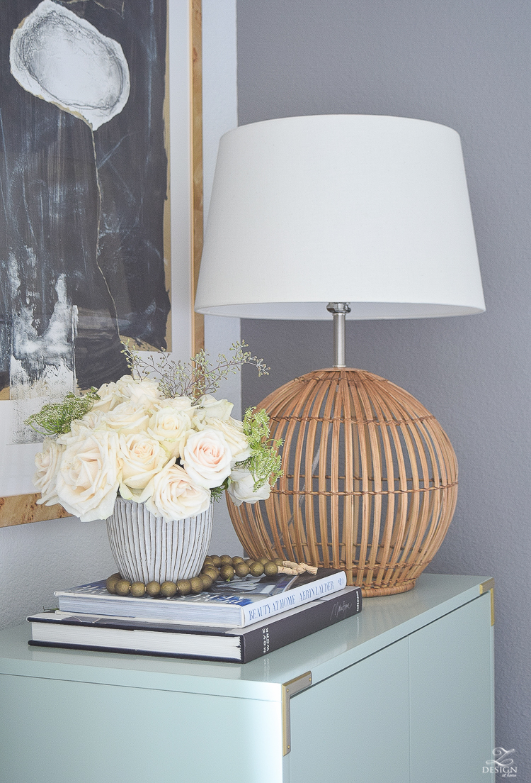 Rattan boho lamp gray decorative pot with white roses wooden bead strand erin lauder coffee table book aqua bar cabinet minted art-2