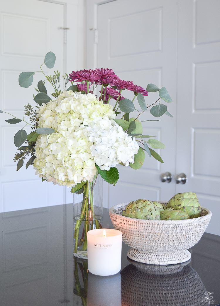 fall flowers mixed with hydrangeas rattan white washed fruit basket white pumpkin candle fall kitchen decor tall clear vase-2