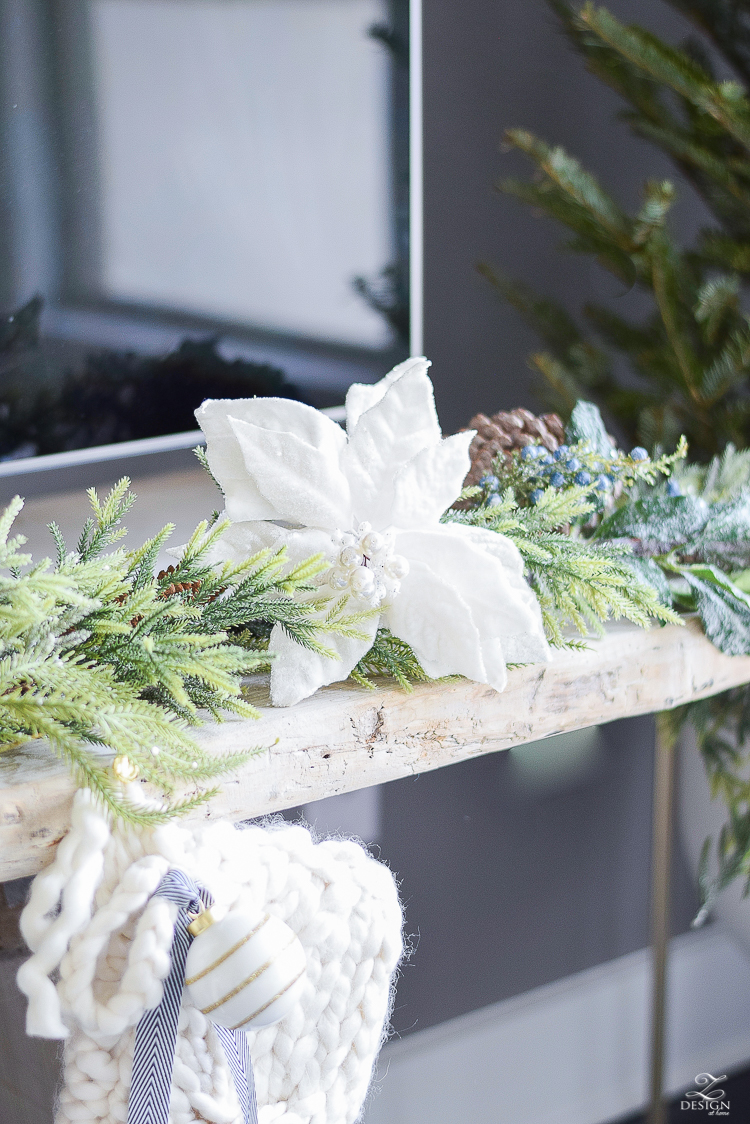 white velvet poinsettia decor - A boho chic christmas living room