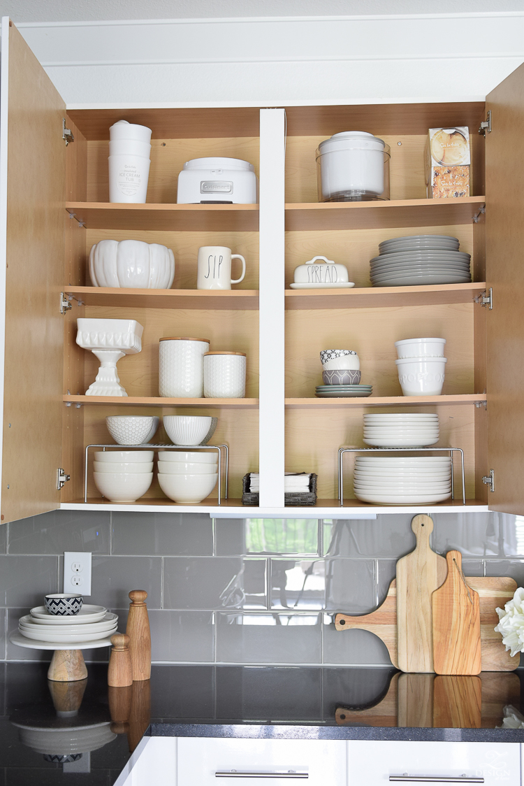 The best way to organize your dishes with cabinet shelf risers