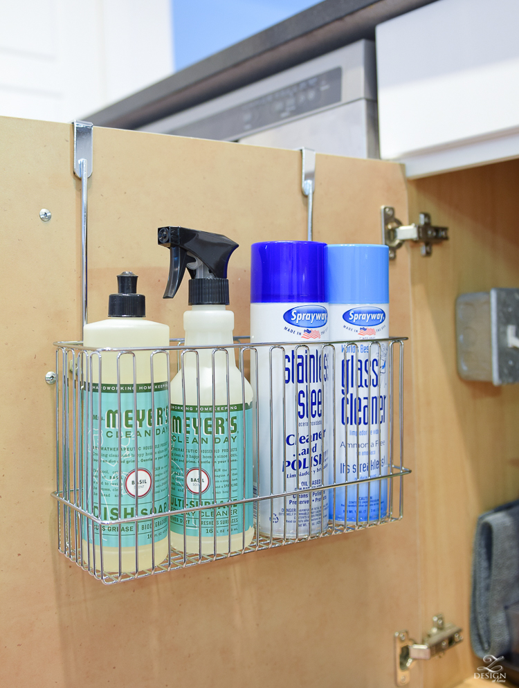 Over the cabinet organizer basket to access items used most to clean the home