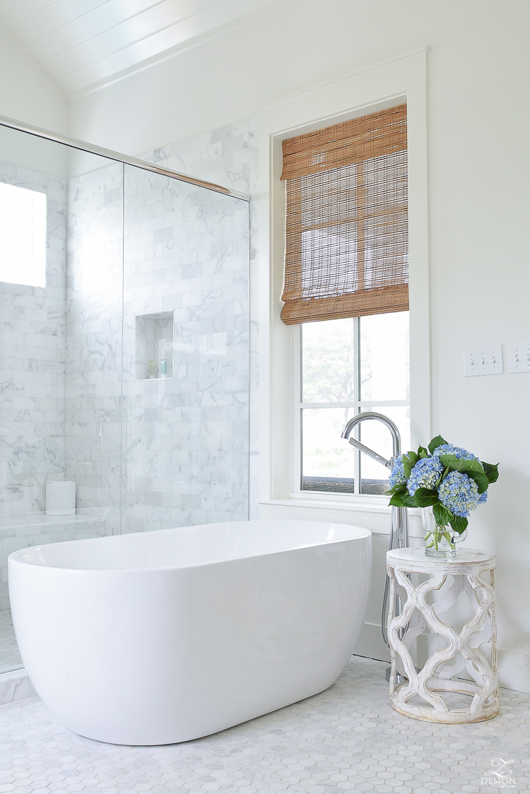 Marble in coastal bathroom shower - marble hex floors