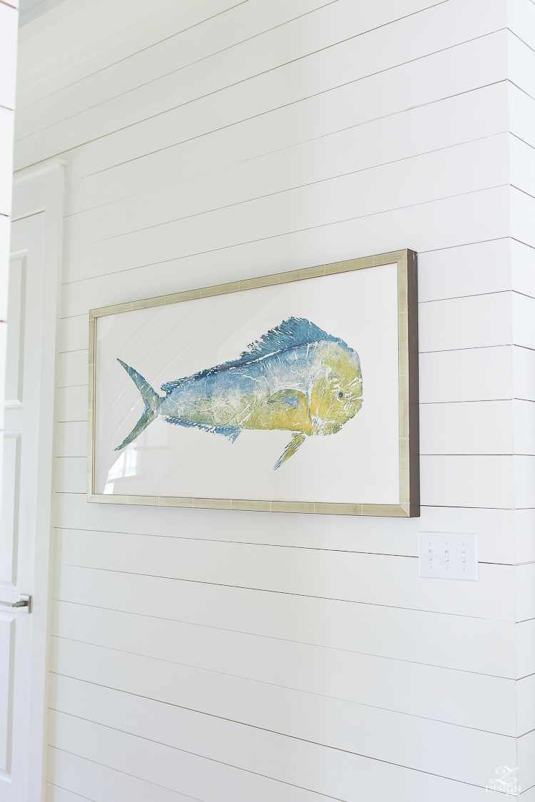 bill fish art in coastal inspired home hung on shiplap