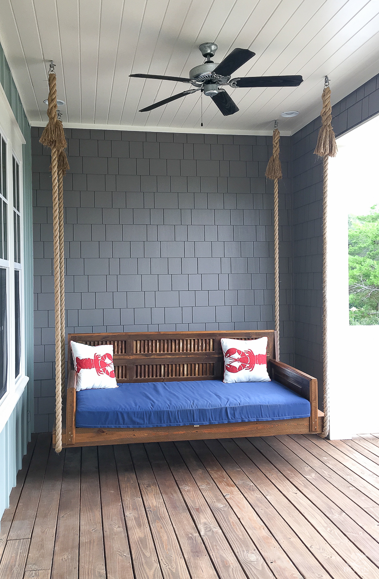 Porch swing daybed suspended by rope - coastal home in 30-A florida for rent