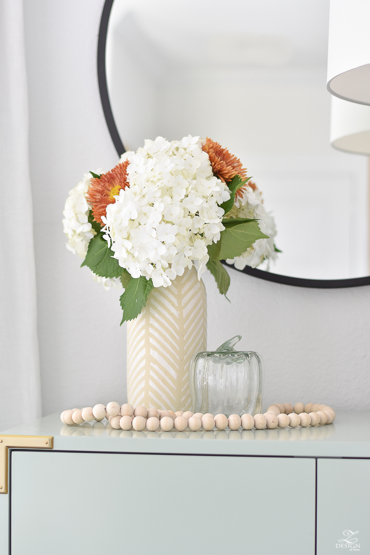 Simple Modern Fall Decorating Ideas - glass pumpkins, hydrangeas in modern vase with mums added