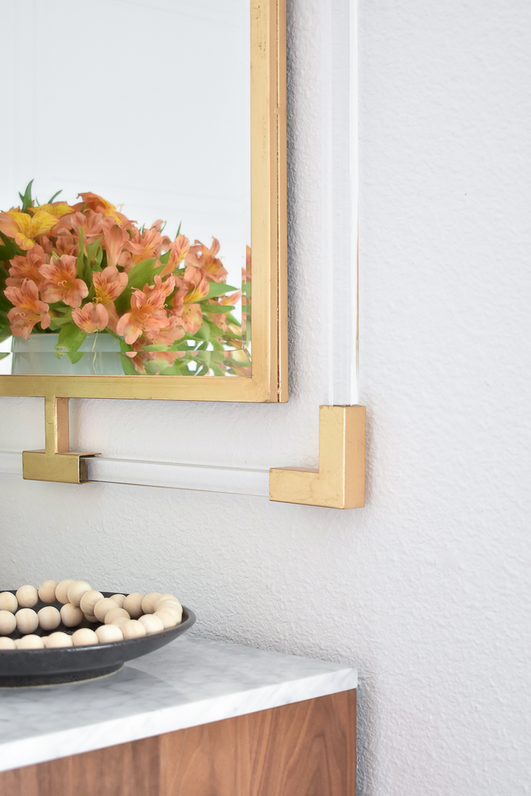 Small Transitional Entryway That Packs A Big Punch - Lucite and Gold Mirror