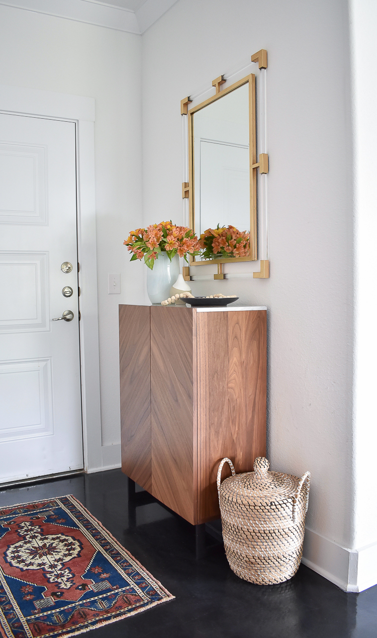 Small Transitional Entryway That Packs A Big Punch - Lucite and Gold Mirror