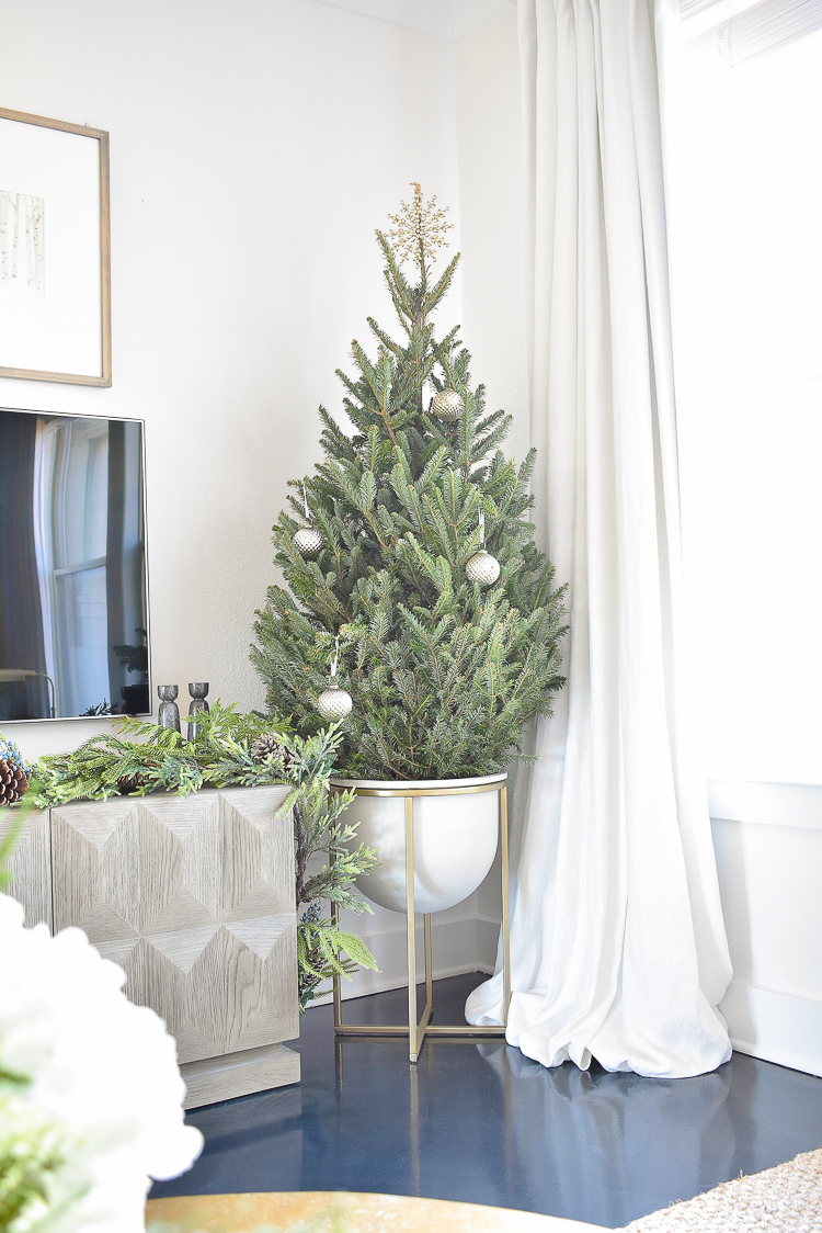 Styled For The Season Christmas Living Room Tour - Christmas tree in a planter