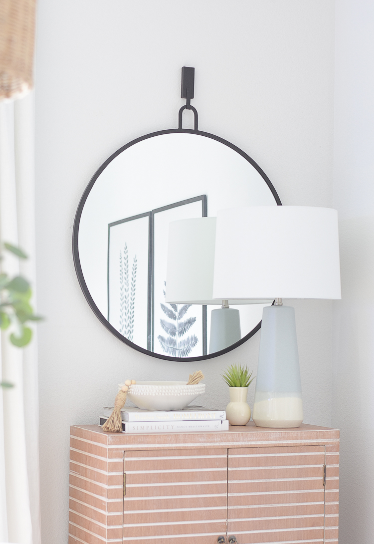 Boho chic dining room reveal - round black mirror