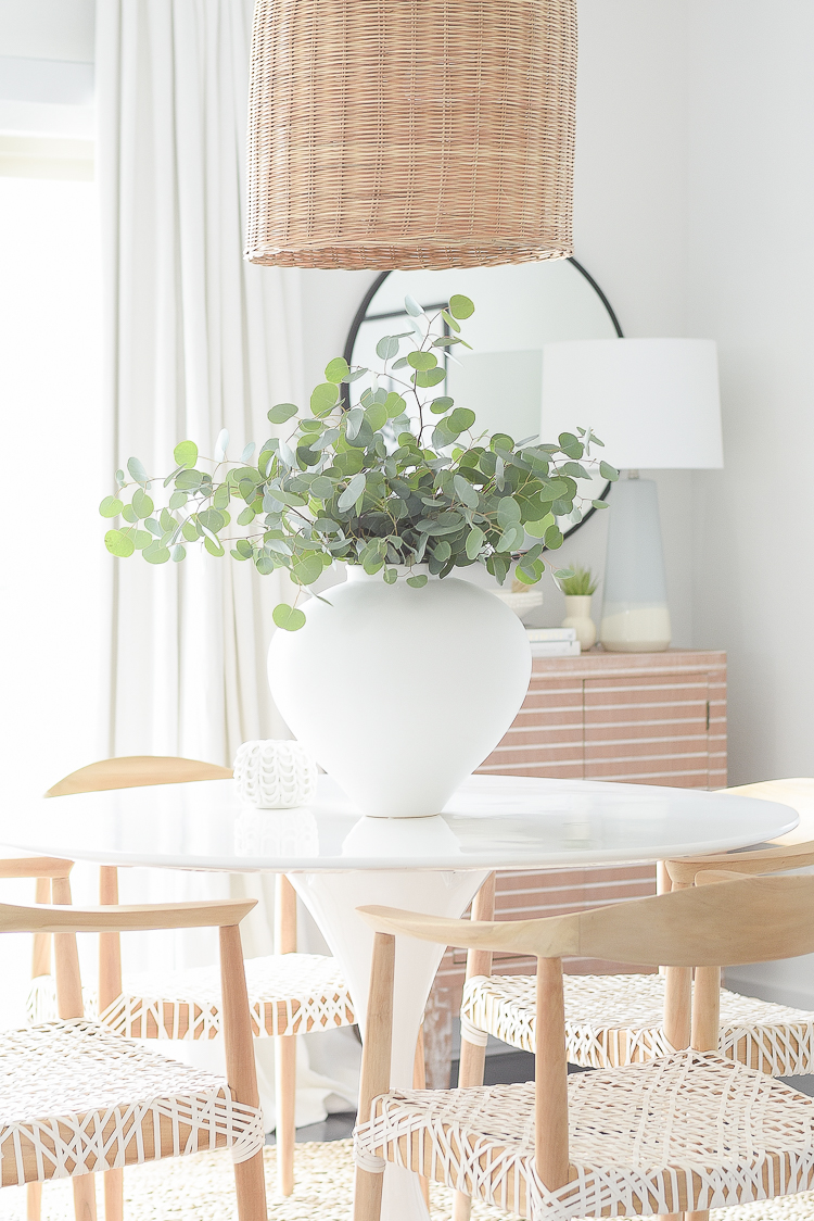 Casual chic Dining Room Reveal - large white vase with eucalyptus bundle