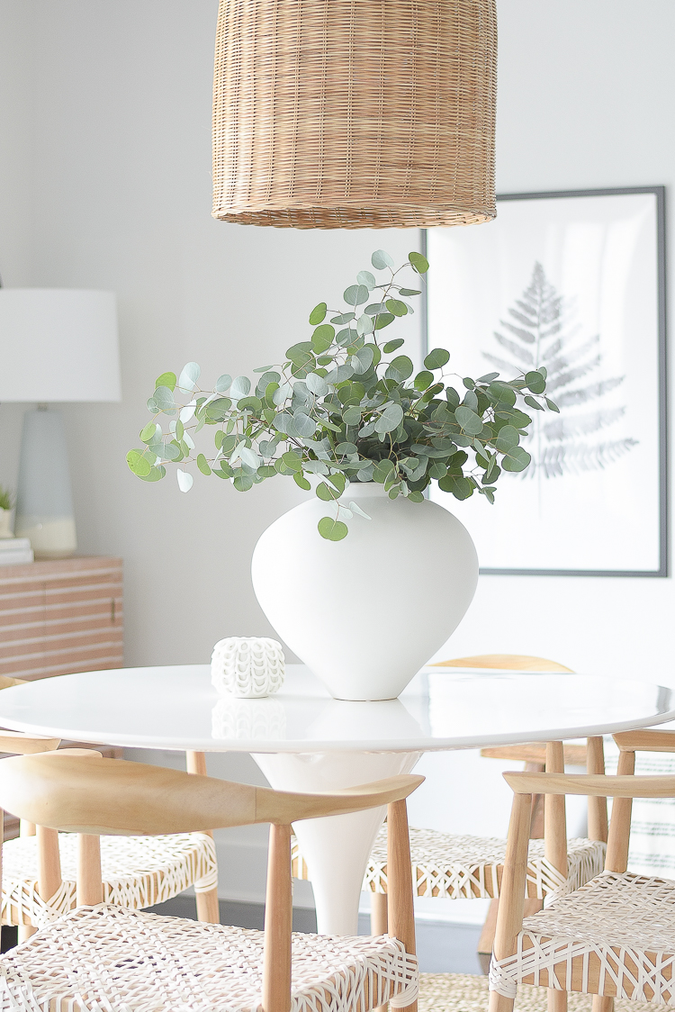 Casual Chic Dining Room Reveal - large white vase with eucalyptus bundle