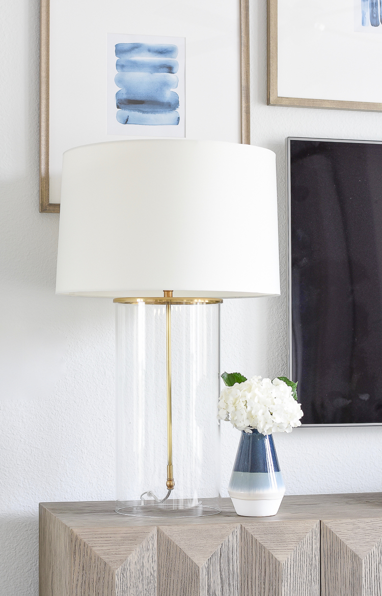 TV gallery wall updates + reveal - glass & brass classic lamp