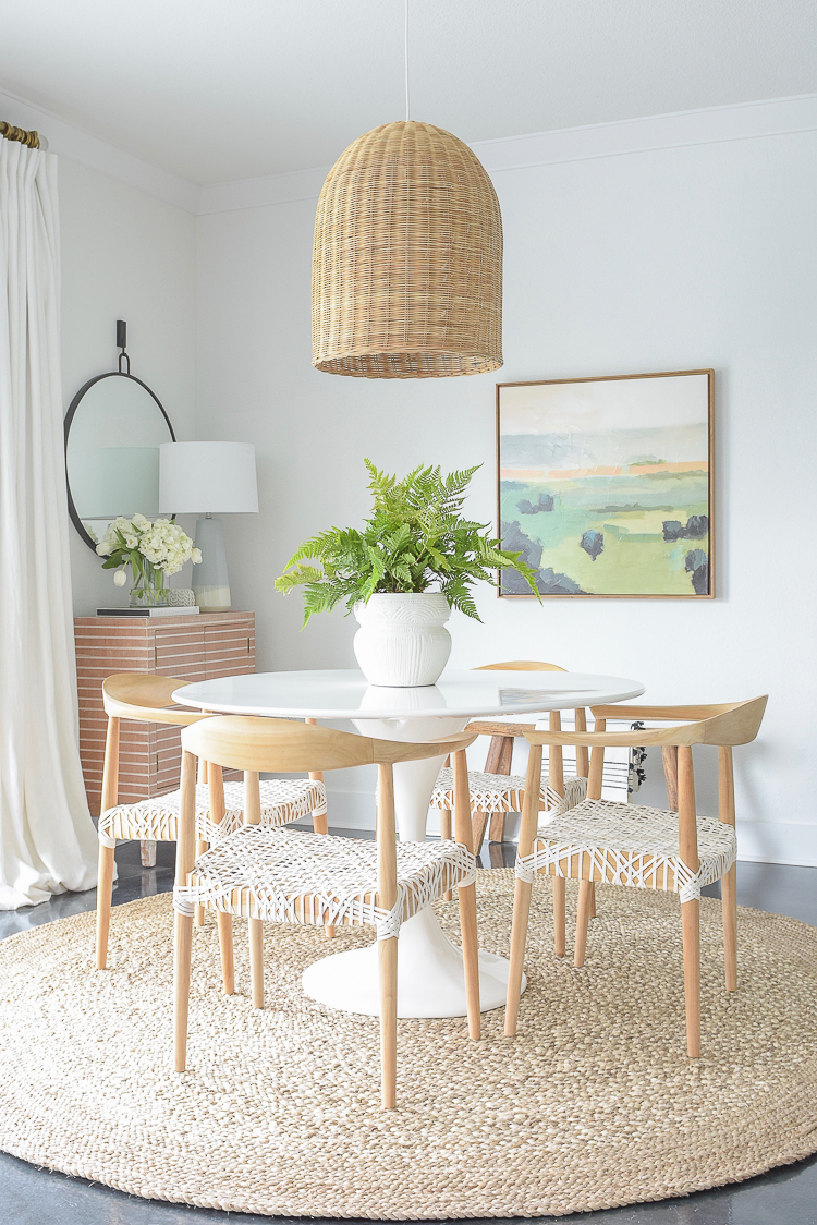 ZDesign At Home Spring Dining Room Tour - Boho Chic Dining Room Design w/ basket pendant, tulip table, round jute rug