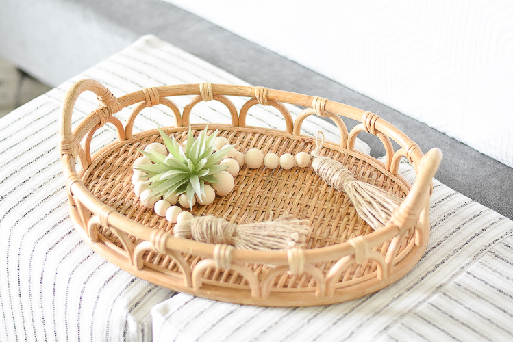 Styled for the season spring tour - rattan textured tray, wooden bead strand with tassels