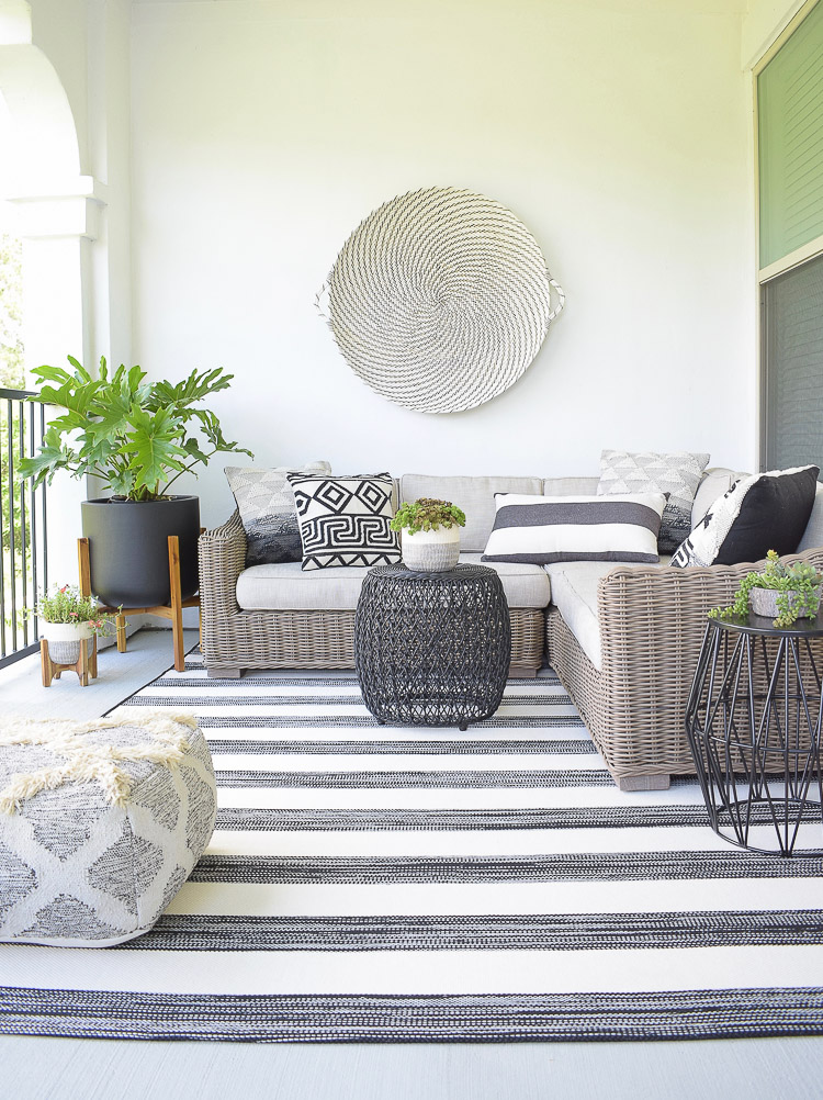 Tips For Creating A Relaxing Outdoor Space This Summer + A Patio Tour - black and white themed patio design