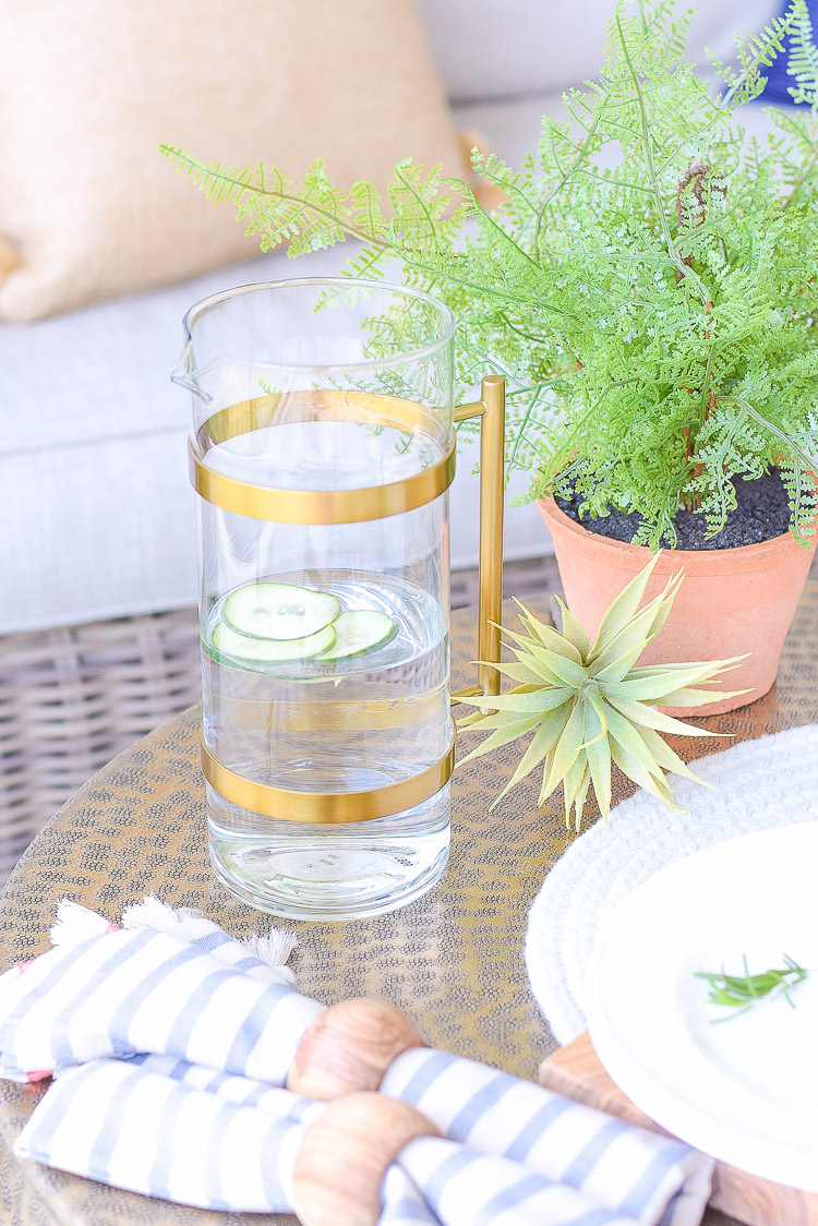 Sustainability outdoor products - brass and glass martini pitcher