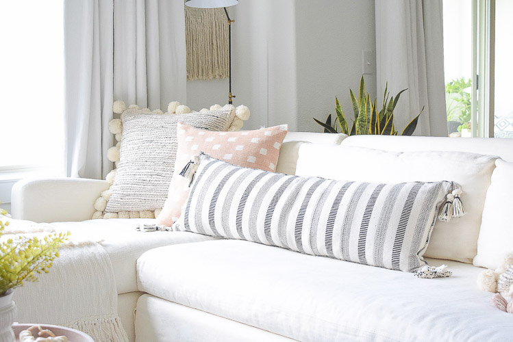 Black and white pom pom tassel pillows, summer living room home tour