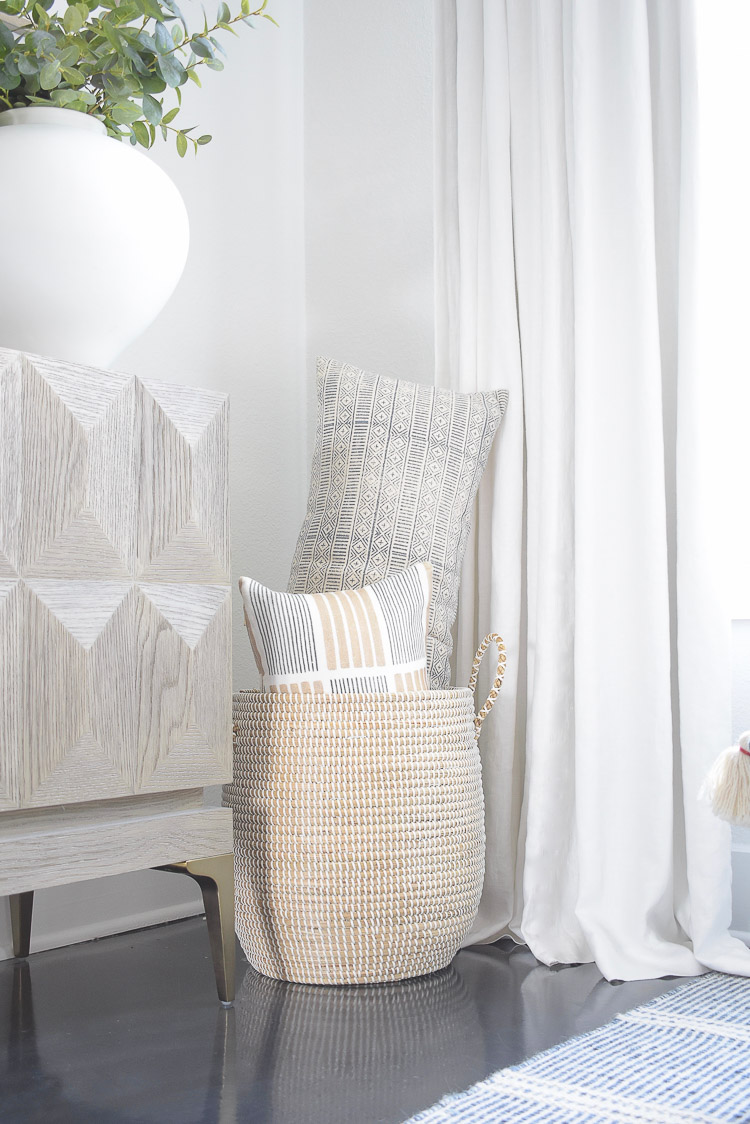 Summer Home Tour - boho pillows in serena and lily lidded white basket