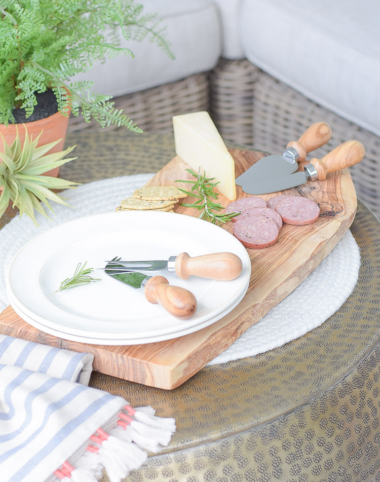 Sustainably sources olive wood cheese board and knives