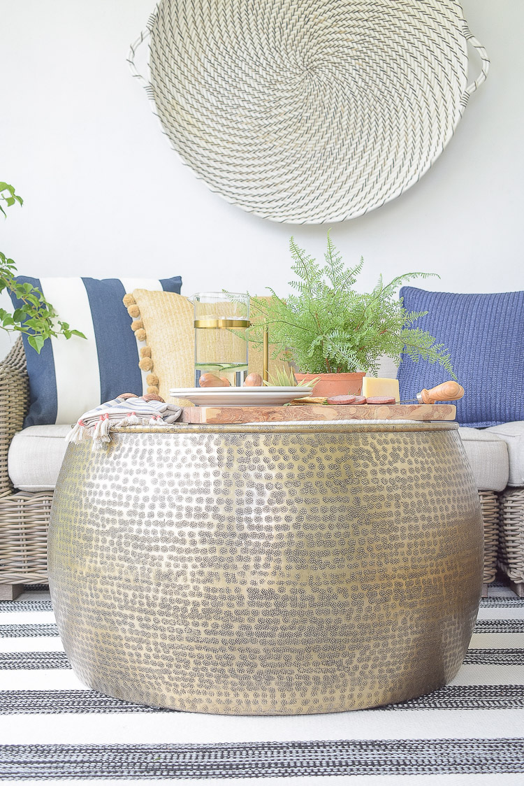 sustainably sourced coffee table in hammered gold - outdoor sustainable furniture