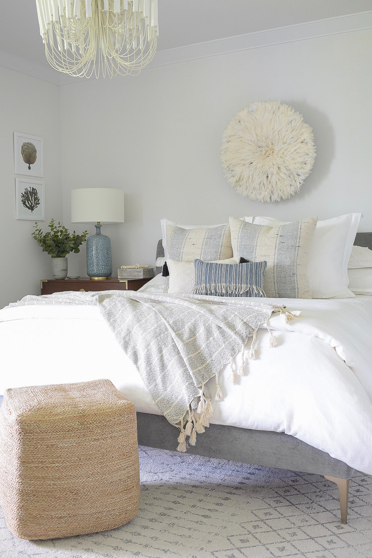 4 Subtle Ways To Add Coastal Decor To Your Home - Blue and White Coastal Inspired Bedroom