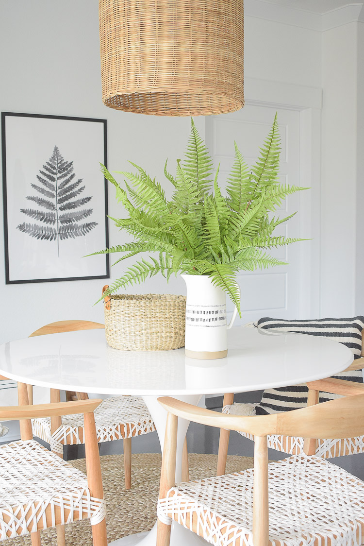 Tips for adding natural summer decor + a dining room tour - beautiful faux fern pics in boho chic vase