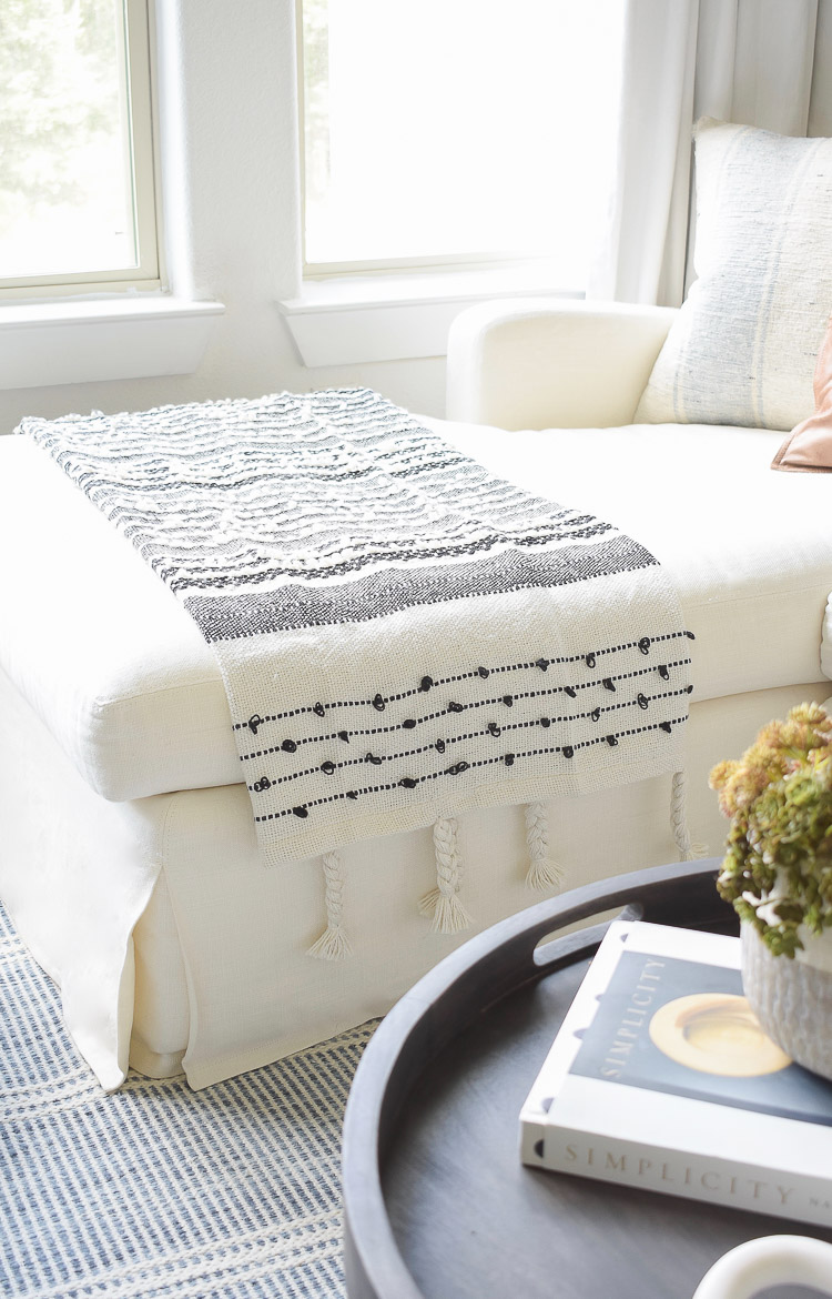 Small space, big style solutions - black and white textured pillows & throws