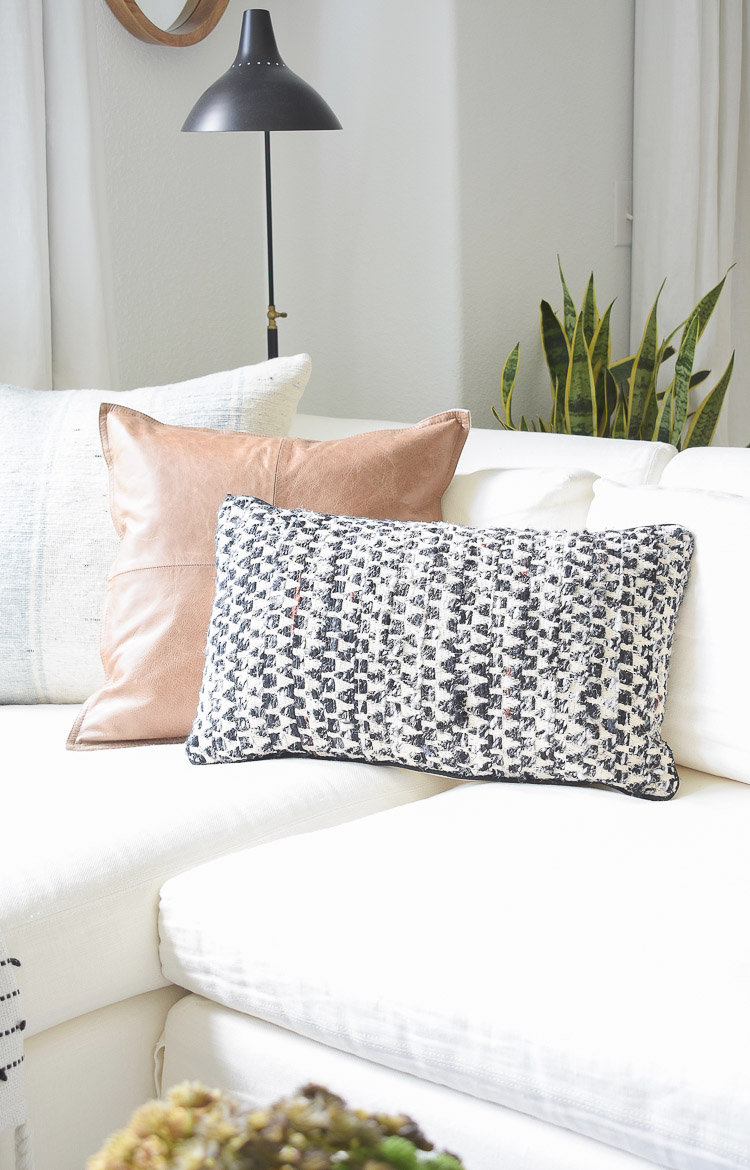 Small space, big style solutions - black and white textured pillows & throws