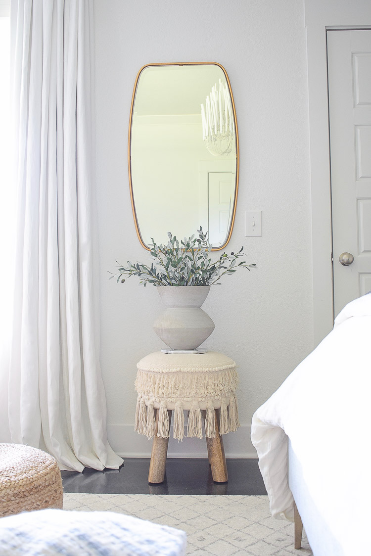 Fall bedroom tour - oval gold mirror, tassel ottoman, 