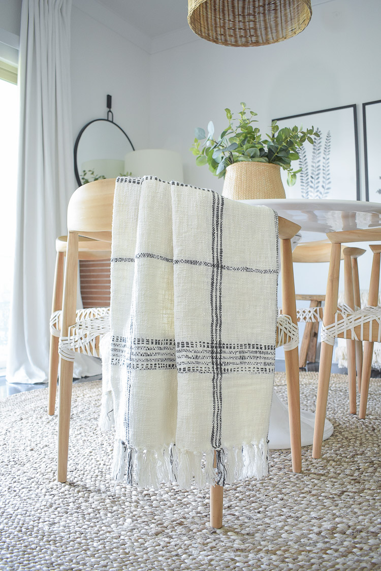 A textured fall home tour - fall dining room tour - plaid window pane throw 