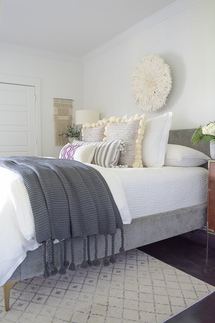 Fall bedroom tour with pom pom pillows, chunky gray tassel throw and white bedding