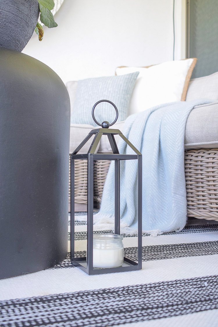 A Cozy Modern Fall Patio Tour - black outdoor lantern for fall 