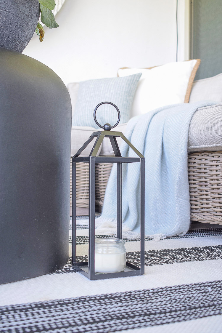 A Cozy Modern Fall Patio Tour - black outdoor lantern for fall 