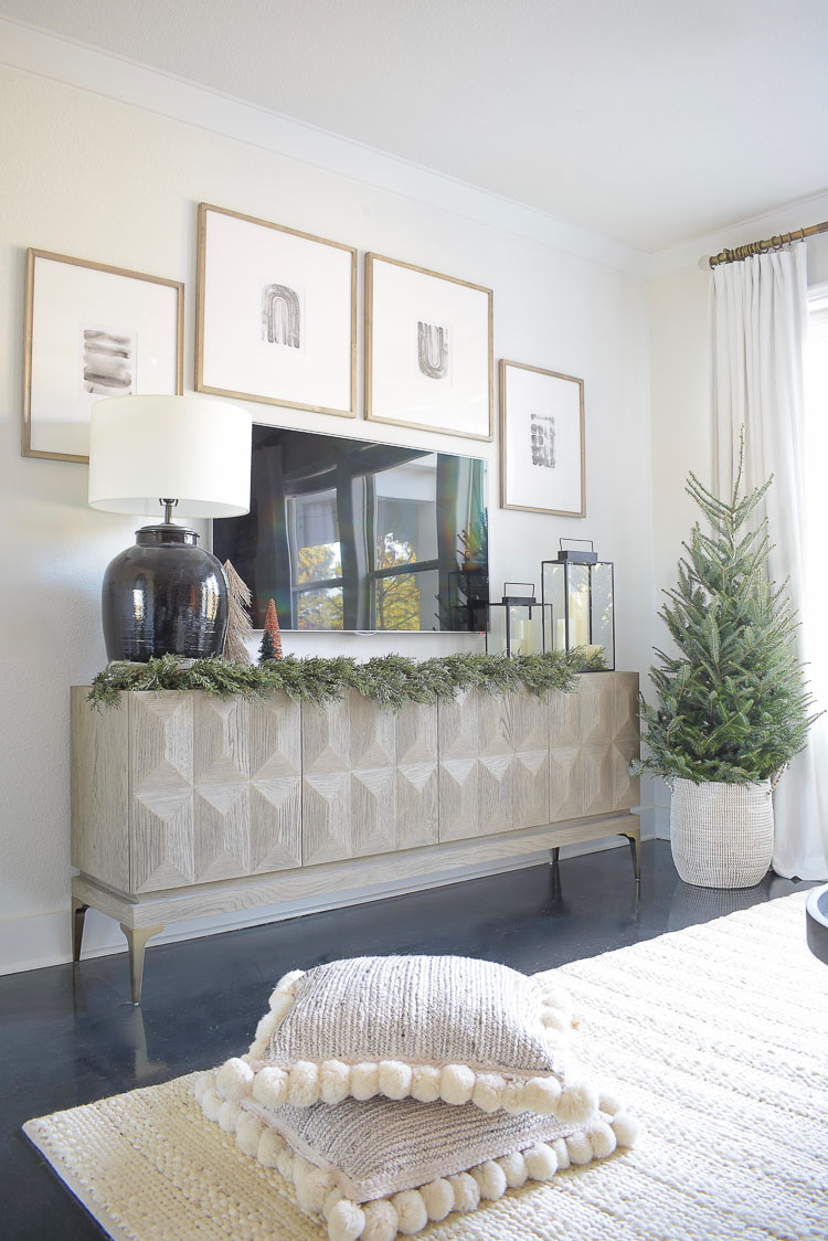 Black, white & gold modern Christmas living room tour - modern gallery wall styled for Christmas