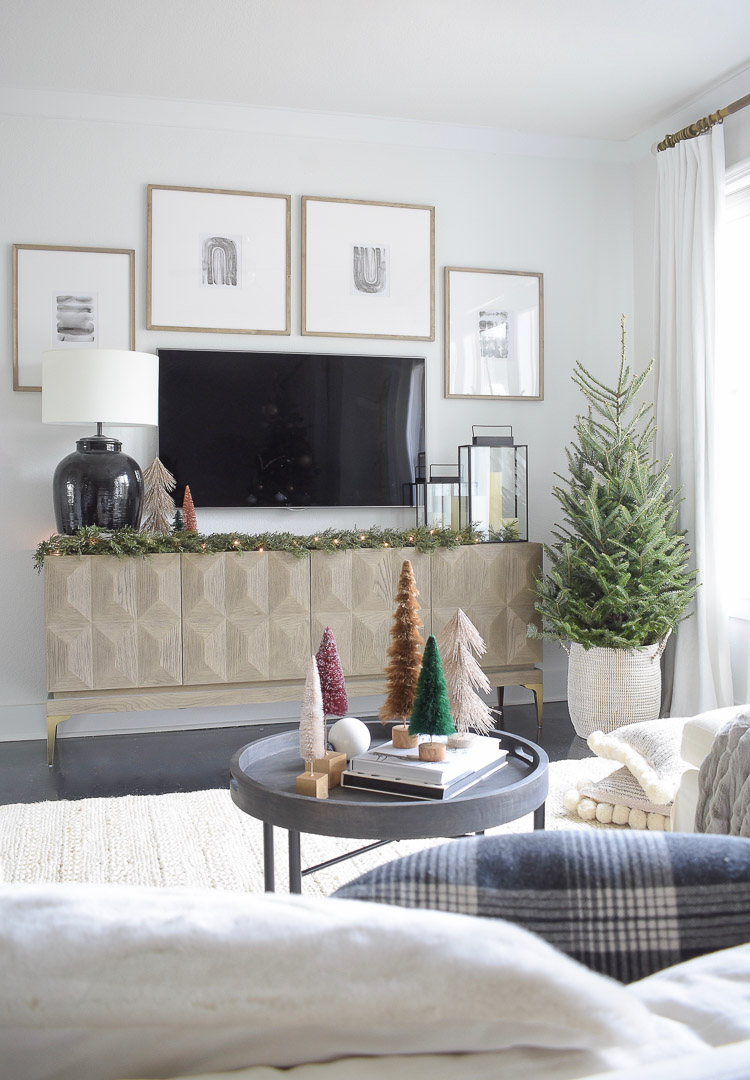 Black, white & gold modern Christmas living room tour - real christmas tree in basket