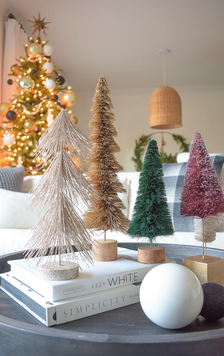 Black, white & gold modern Christmas living room tour - bottle brush trees