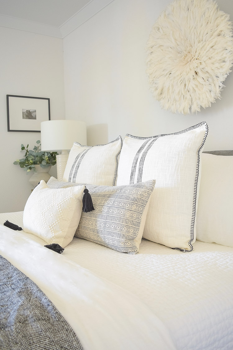 Spring bedroom tour - black and white boho pillows 
