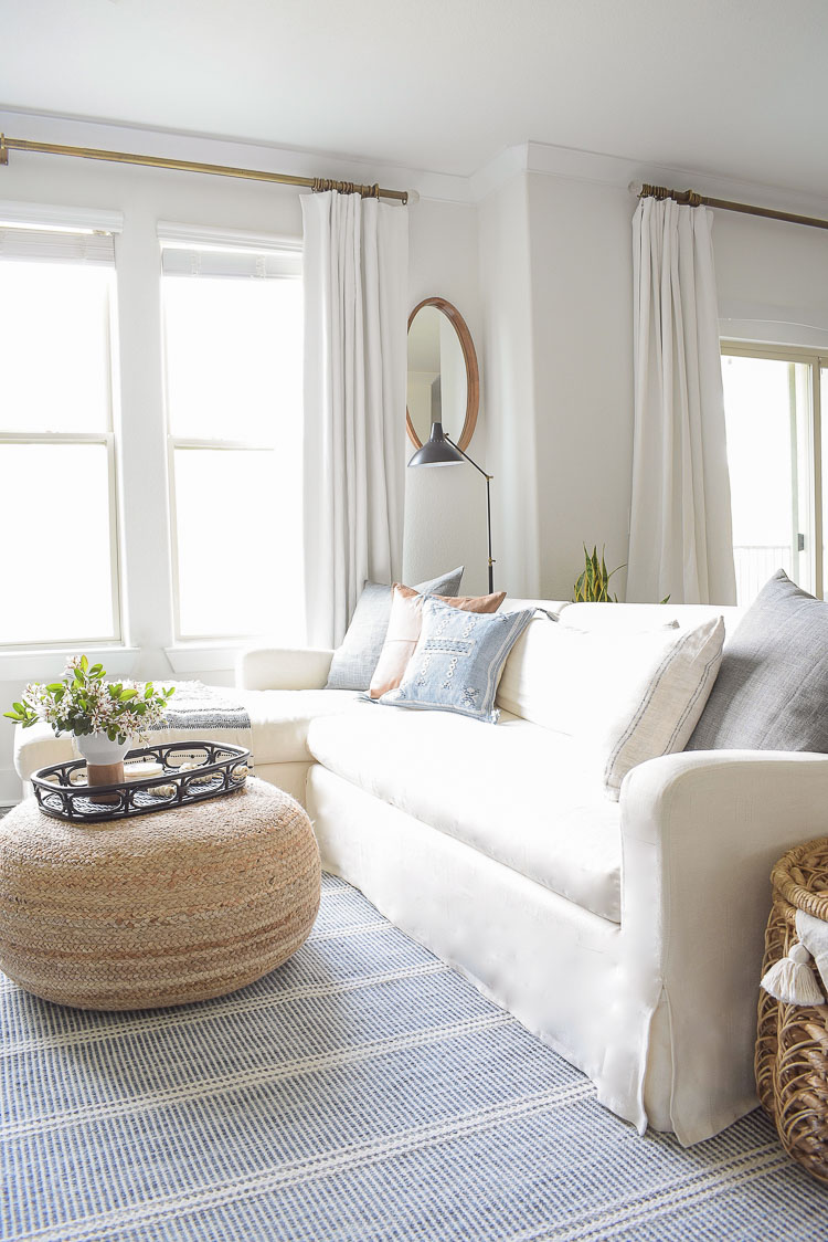 blue and white patterned annie selke rug in spring living room tour 