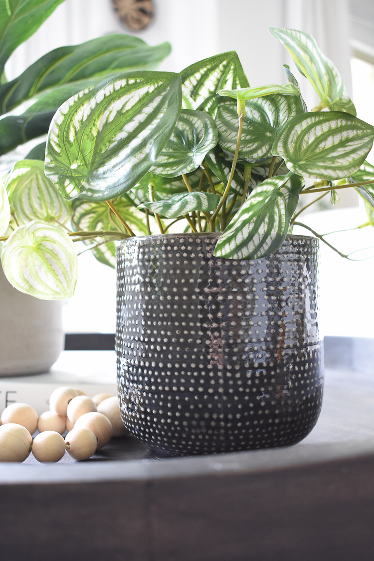 Ceramic pot with white dots for faux house plant 