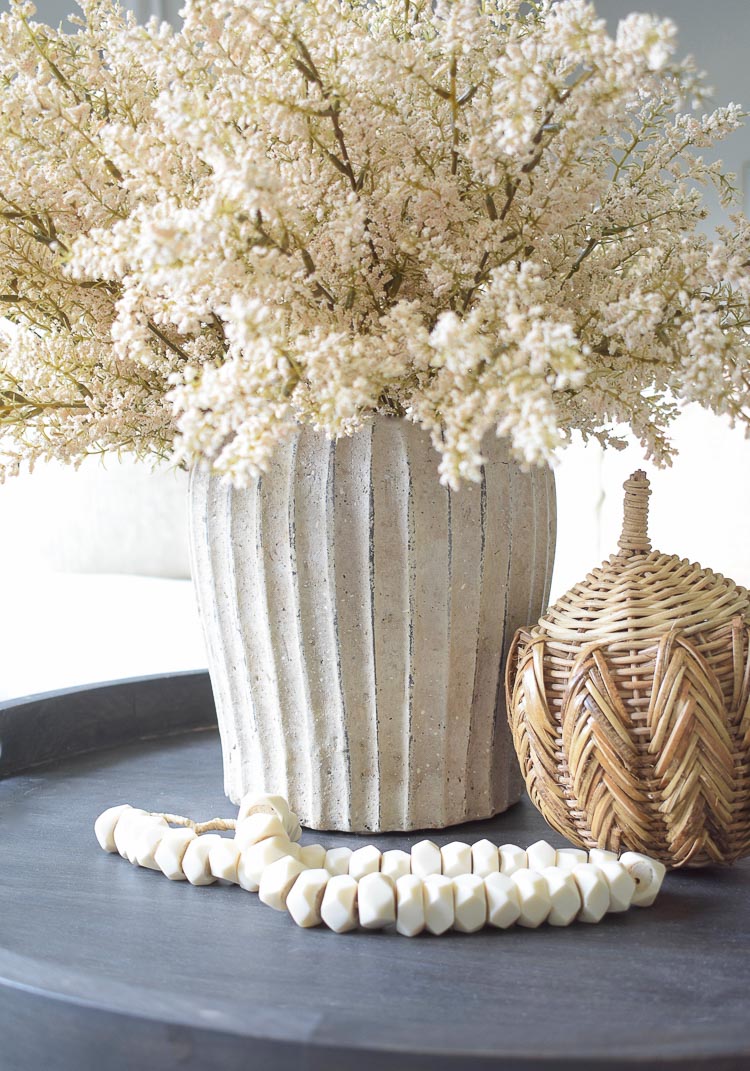 weathered white fluted terra cotta pot