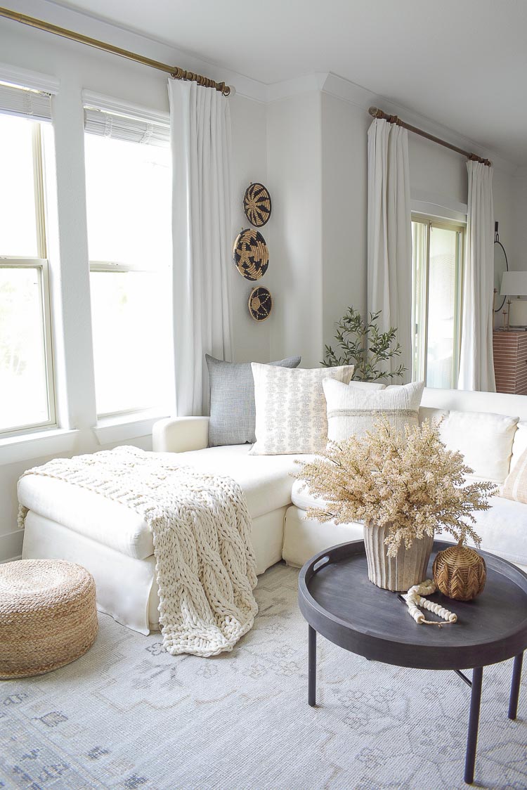 Layered Neutral Fall Home Tour - cable knit throw, fall pillows, vintage inspired rug