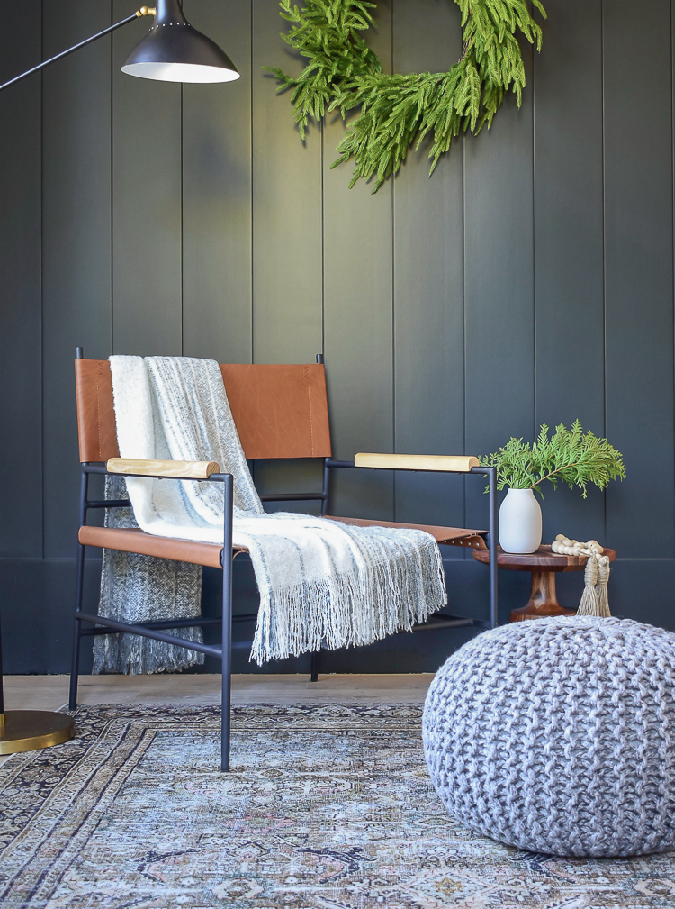 modern leather sling chair, black vertical shiplap wall, olive charcoal rug from Joss & Main Winter Edit 