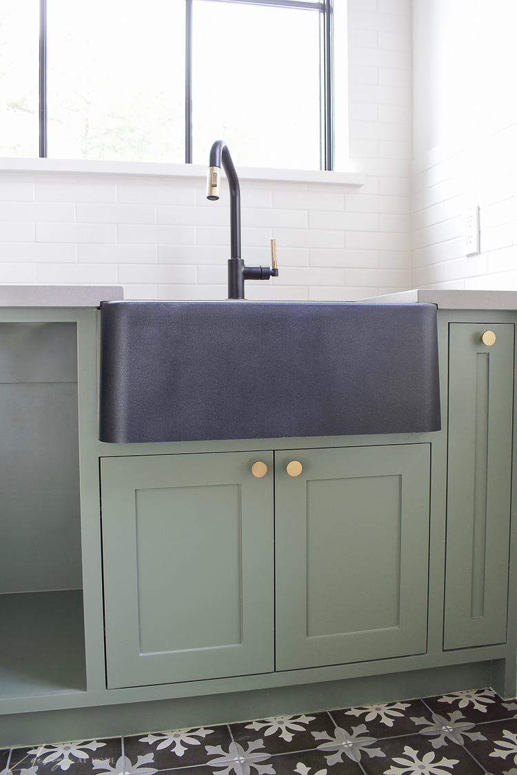 Blanco Ikon 27" farmhouse sink in black, green laundry room cabinets , dried thyme