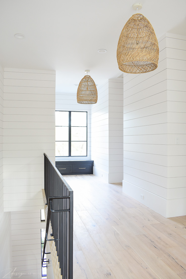 Hallway with basket pendants and window seat