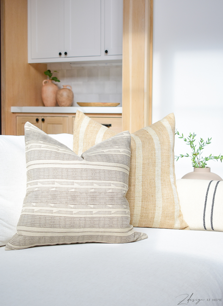 spring pillow refresh with modern farmhouse pillows - how to style your pillows on your sofa 