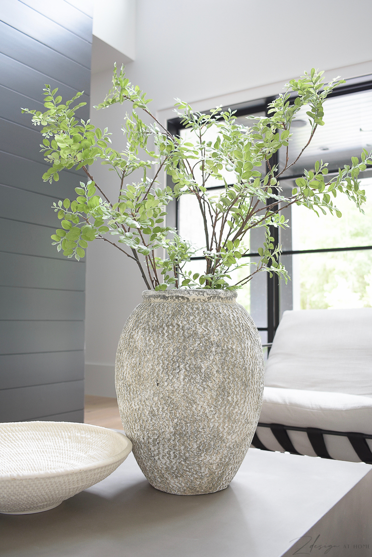 large gray textured table vase on modern concrete coffee table