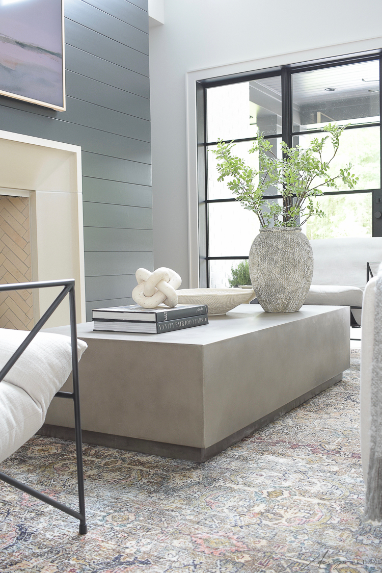 concrete coffee table with modern accessories 